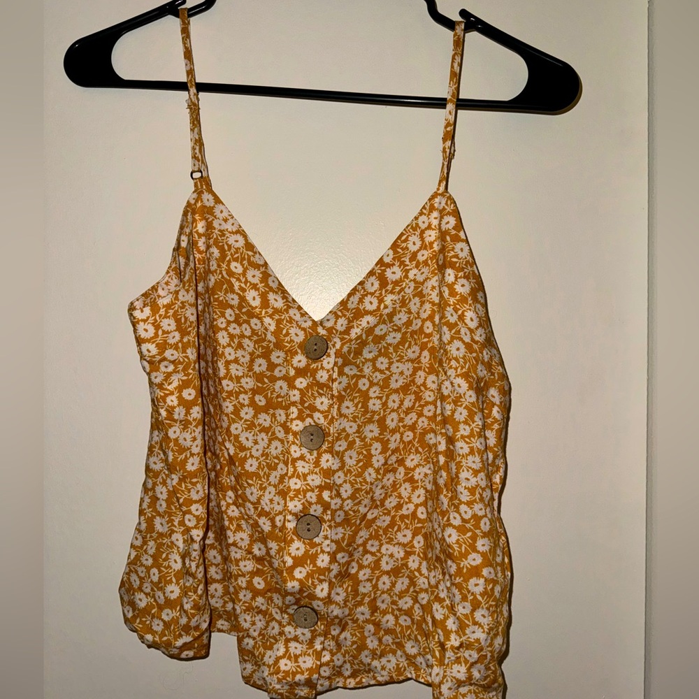 Very pretty summer top with flowers and buns down the middle for women